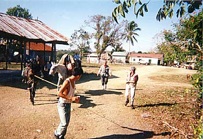 Start Trail at Community Carmalita Loading pack mules - El Mirador - Maya Expeditions