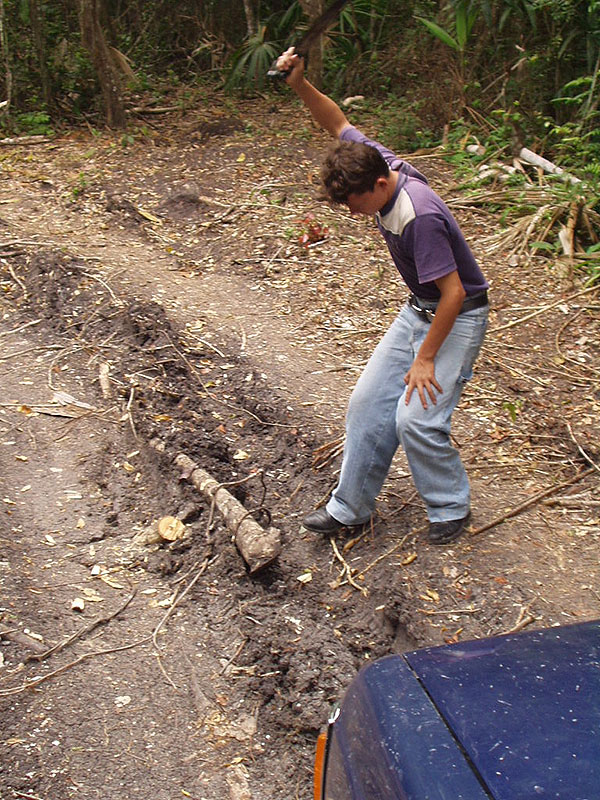 Machete Kid clearing the road to San Bartolo and Xultun photo by Les