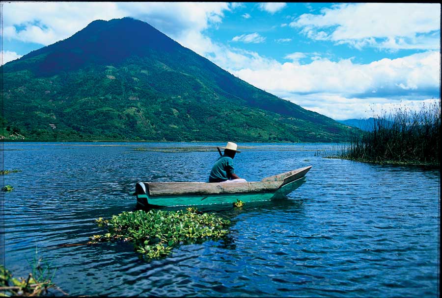 Local Fisherman in wooden cayuco boat on Lake Atitlan Photo by INGUAT