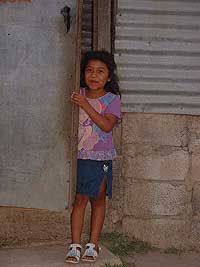 AFENJ - Unidos por la Paz, girl at front door - Maya Expeditions
