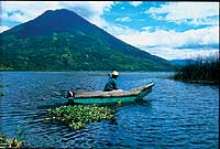  Local Fisherman in wooden cayuco boat on Lake Atitlan - Photo by INGUAT - Maya Expeditions